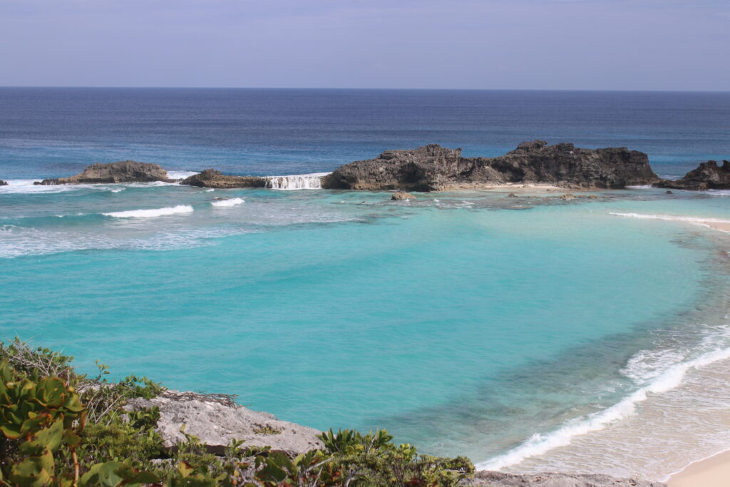 Turks and Caicos travel blog  travel blog for empty nesters travel blog for adventurous families oh the adventures we go ocean club east Cabana Bar Opus The Landing restaurant Turks IGA for groceries on Turks Jack's Fountain Magnolia Bugaboo's views of blue water Turks and Caicos sunset over Grace Bay beach Pelican Bay Talbot's adventures snorkeling reef fish Fort George Cay lemon shark Pine Cay Half Moon Bay cast away iguana island Turks Head beer Somewhere Cafe coral gardens on grace bay Baci sit on the outside deck ferry to north and middle caicos TCI Ferry Mudjin Harbor dragon cay mudjin bar and grill crossing place trail Bambarra beach Providenciales Kalooki Mangroves Big Blue Collective kayak turtles Skull Rock Bella Luna pizza Chalk sound Las Brisas Sapodilla Bay Grace Bay Adventures Turtle Cove La Famille Long Bay kite surfing surf surfers happy hour sunset caicos cafe bike ride to long bay travel inspiration Lemon2go Turkberry Da Conch Shack